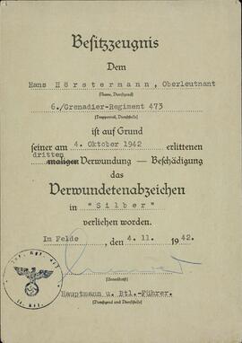 "Hans Hörstermann. Certificado adjudicación del distintivo de herido en plata. 4 noviembre 1942"