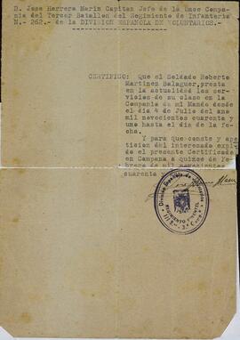 Certificado del Capitán Jefe de la Once Compañía del tercer batallón de Regimiento de Infantería de la División de Voluntarios a favor del soldado Roberto Martínez Balaguer que ha prestado servicios desde el 4 de julio de 1942 al 15 de febrero de 1942. Firmado en campaña.